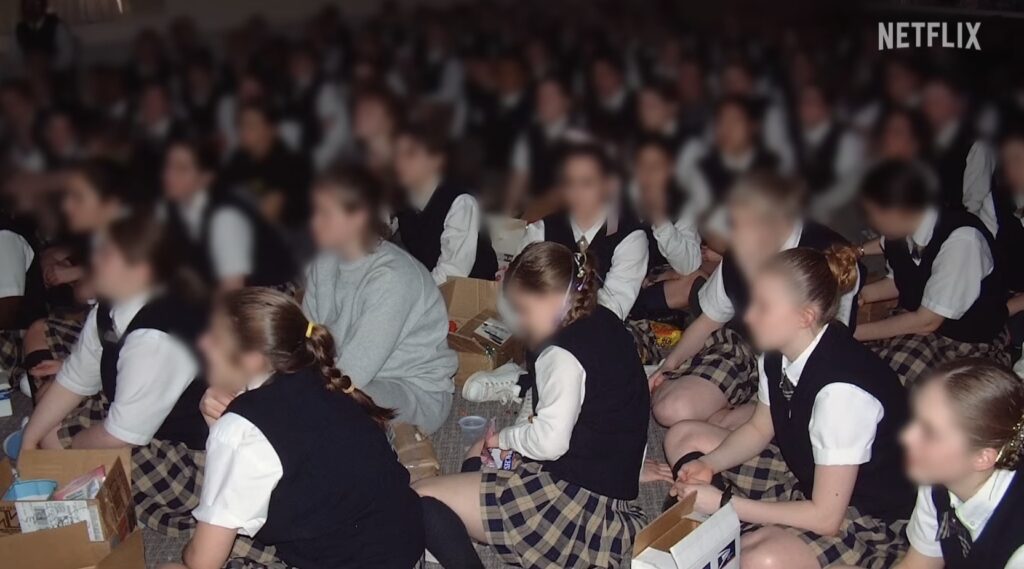 Students at Academy at Ivy Ridge, Netflix.

The Program: Cons, Cults, and Kidnapping 